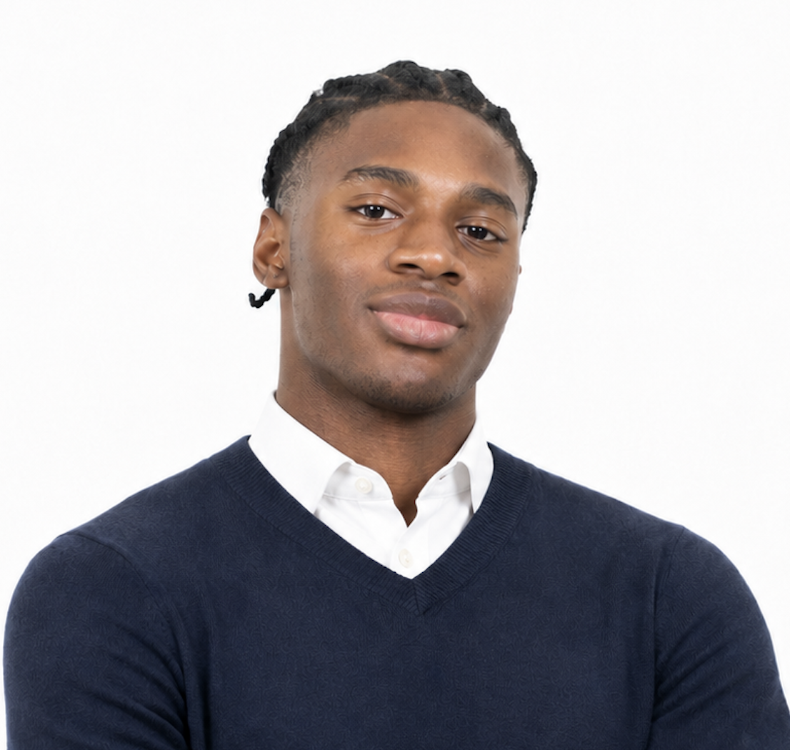 Professional headshot of Derek Ike in a navy V-neck sweater