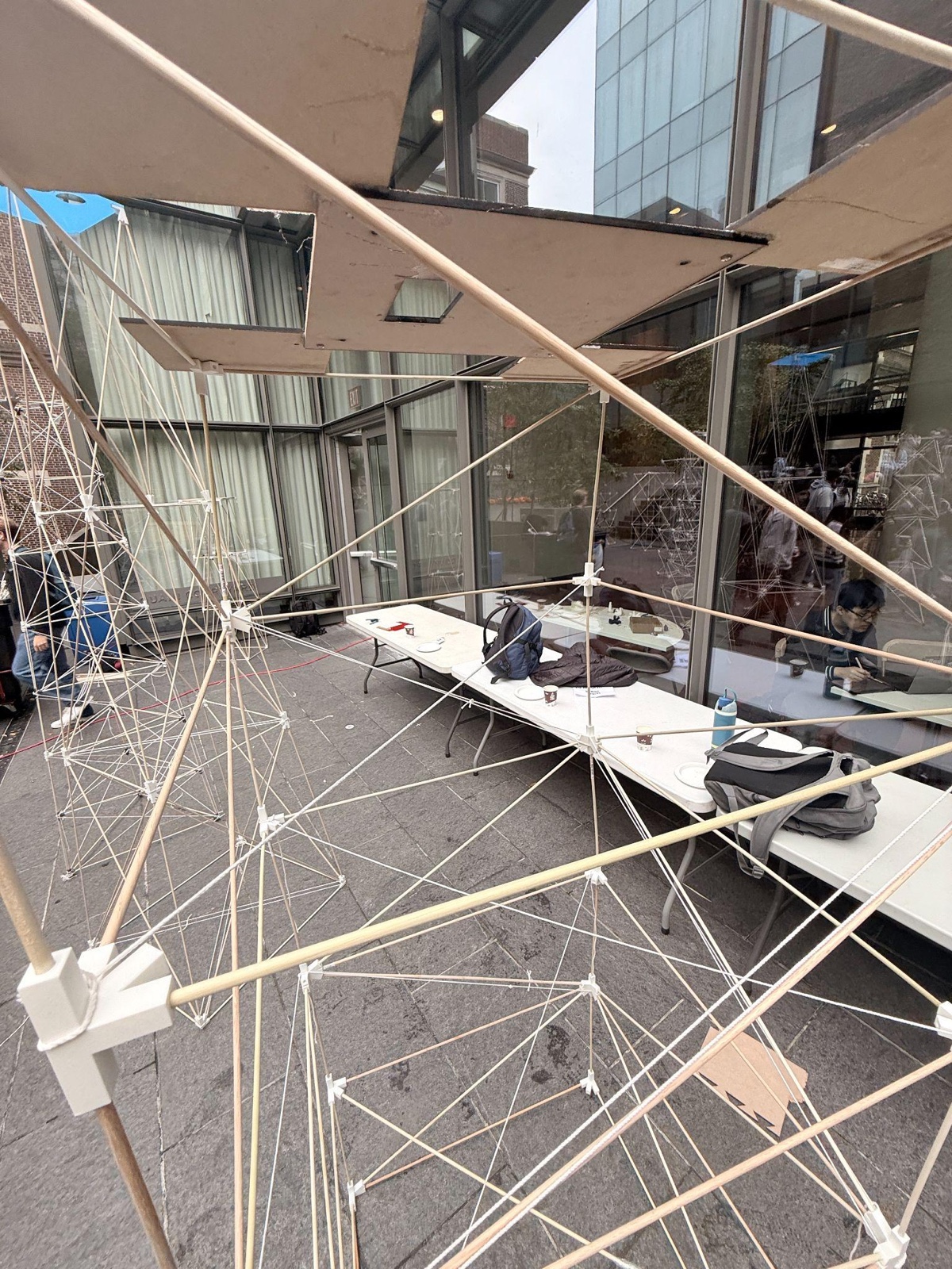 Looking up through the tower's internal birch-dowel truss and 3D-printed connector nodes